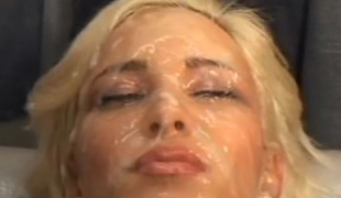 Bukkake. Cute blonde maturing gets her face drenched in sperm