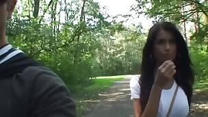 The non-professional pair is taking a hike in the nearby forest