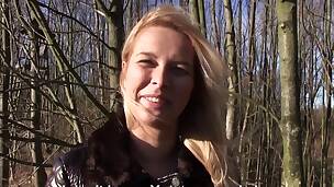 Pretty blond sweetheart sucks dick in the forest for money